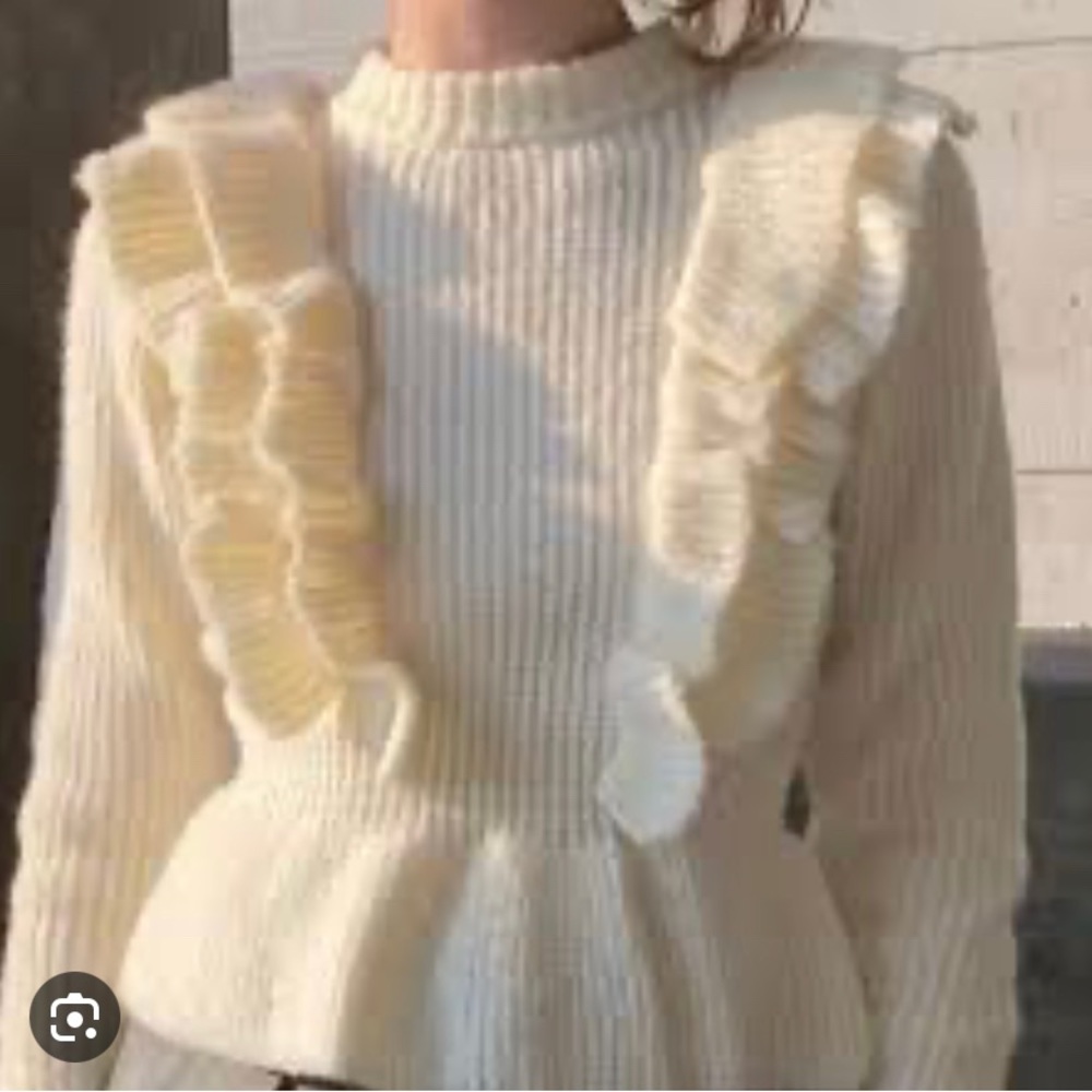 Peplum sweater by Greylin